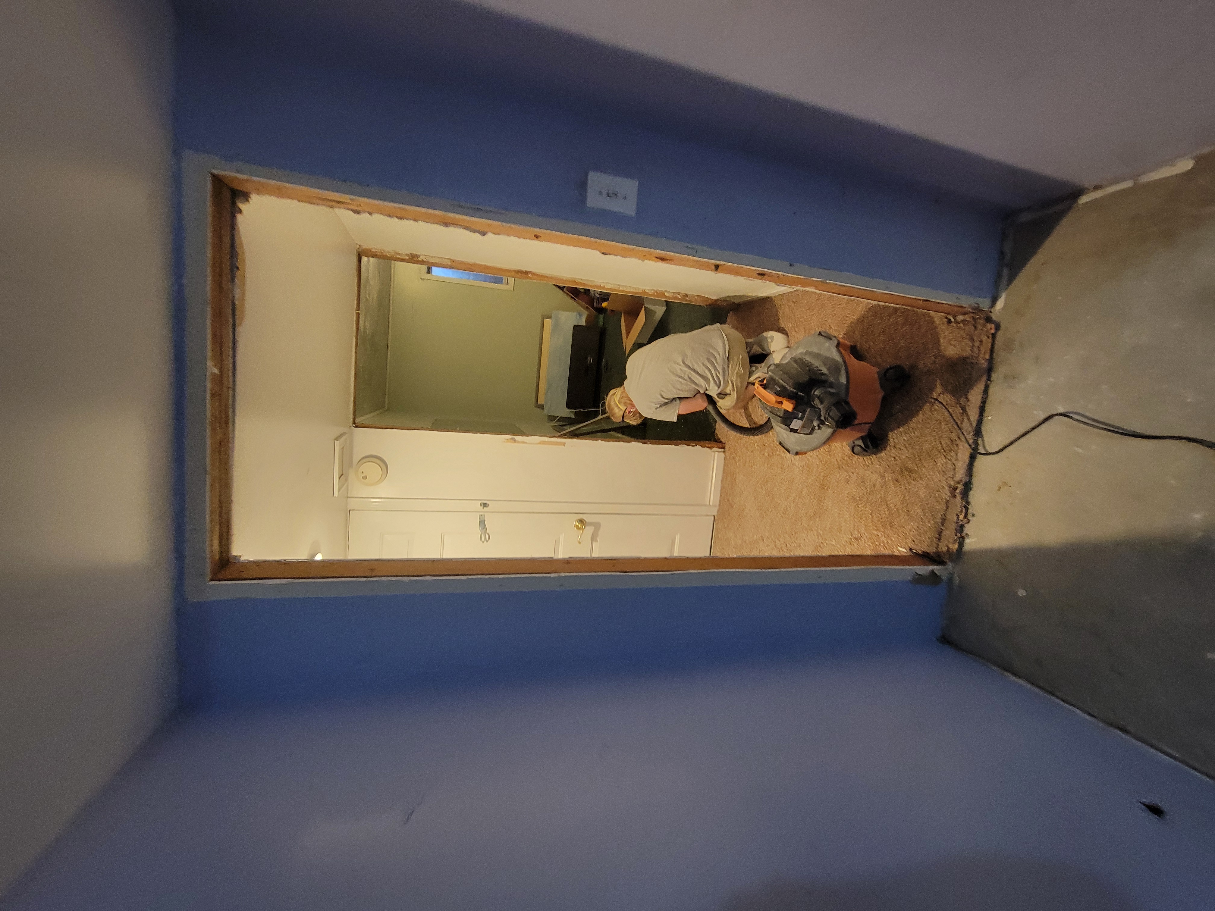 Handyman performing bathroom demolition work in Utah County home